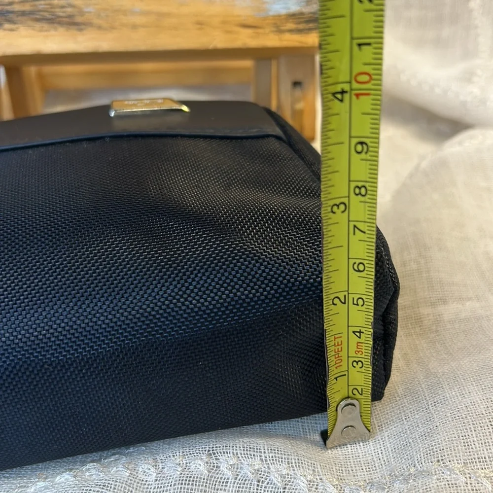 Tumi NWT cosmetic travel bag filled with goodies all new in packages